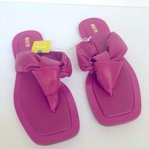 Cute pink flip flops Anthropologie